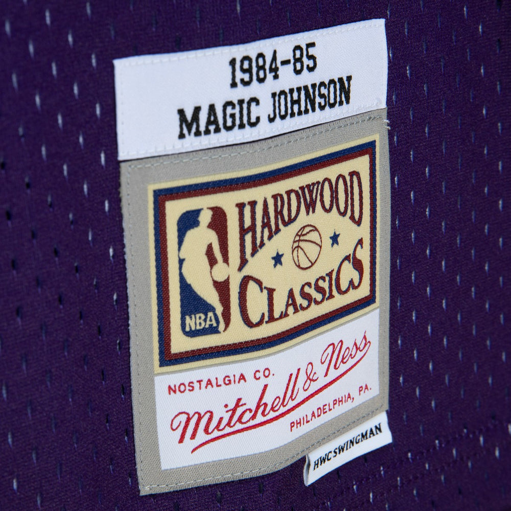 Magic Johnson Los Angeles Lakers 1984/85 Hardwood Classics Fadeaway Swingman Player Jersey - Purple/Black